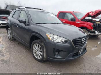  Salvage Mazda Cx