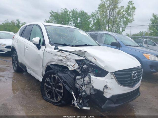  Salvage Mazda Cx