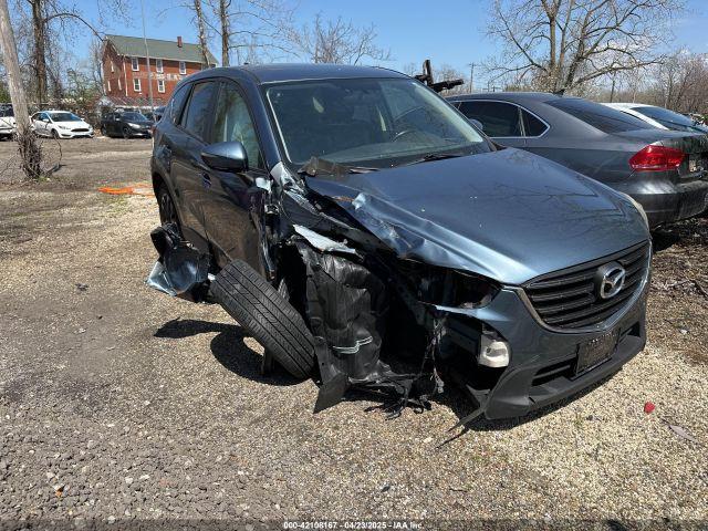  Salvage Mazda Cx
