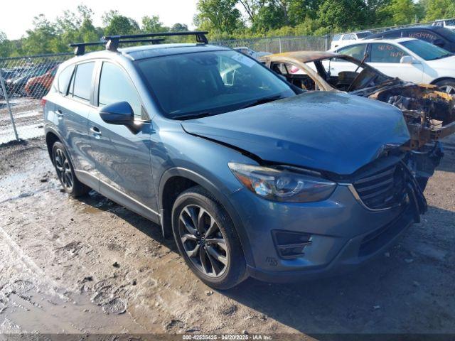  Salvage Mazda Cx