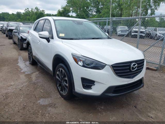  Salvage Mazda Cx