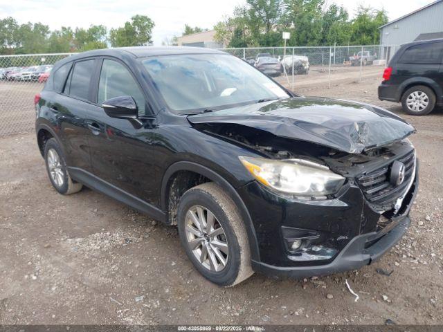  Salvage Mazda Cx